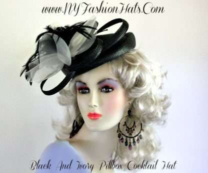 Women's Black Art Deco Styled, Pillbox Cocktail Designer Hat, With An Ivory Bow, And Black Feathers. A Perfect Hat, For Black Tie Events, Holiday Office Parties, Church, Temple, Weddings, And Special Occasion. By www.NYFashionHats.Com